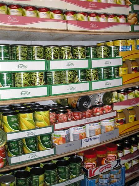 cans of food on supermarket shelves