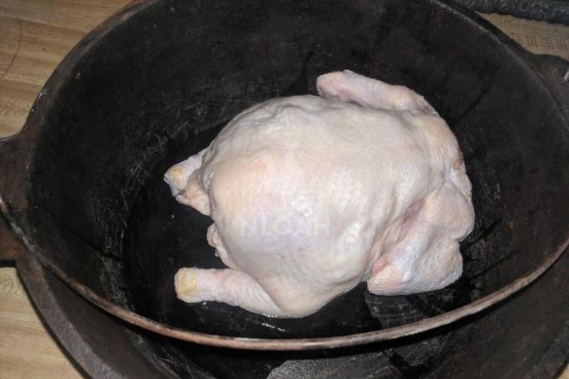 whole chicken inside the cook pot