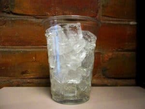 glass filled with ice cubes