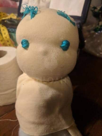 waldorf doll with eyes sewn