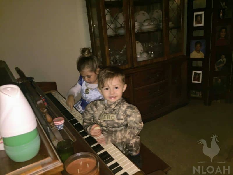 kids playing the piano