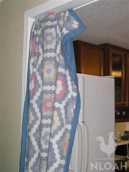 blanket hung in doorway