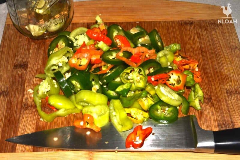 hot peppers on cutting chopped board