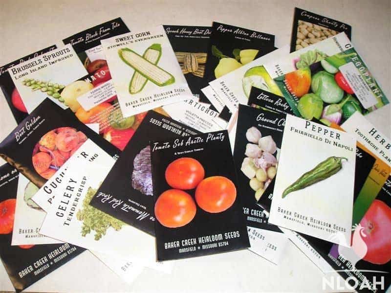 various seeds packets on table