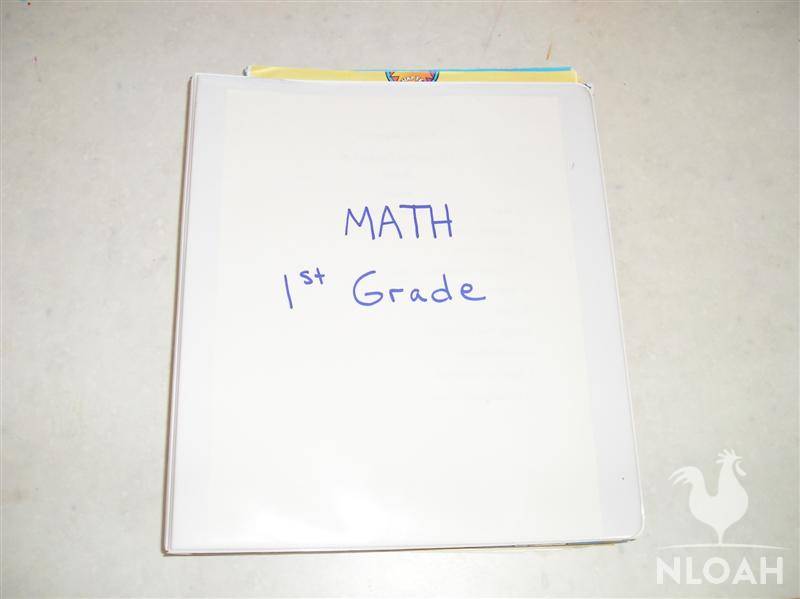 white binder for 1st grade math book