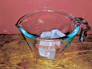glycerin soap base in measuring cup