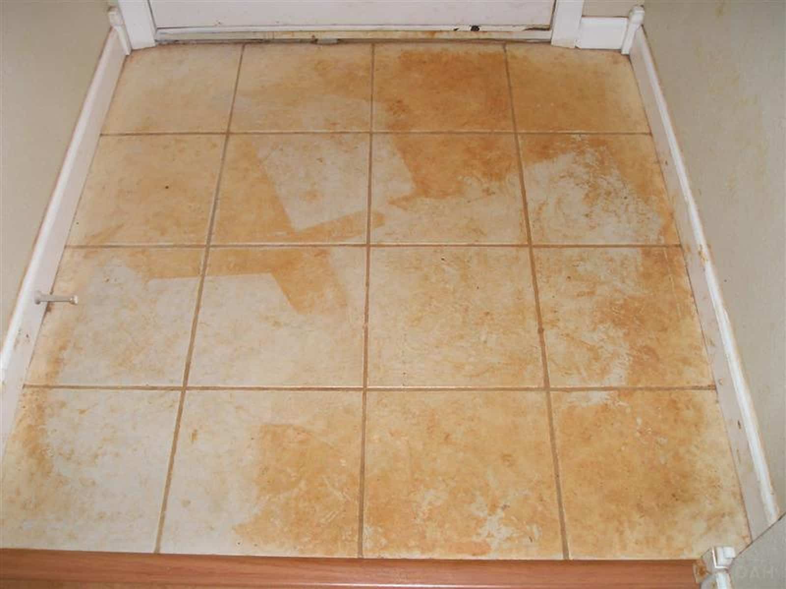 red mud stain on tile