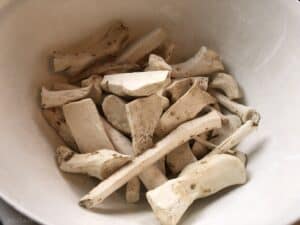 cleaned horseradish roots in bowl