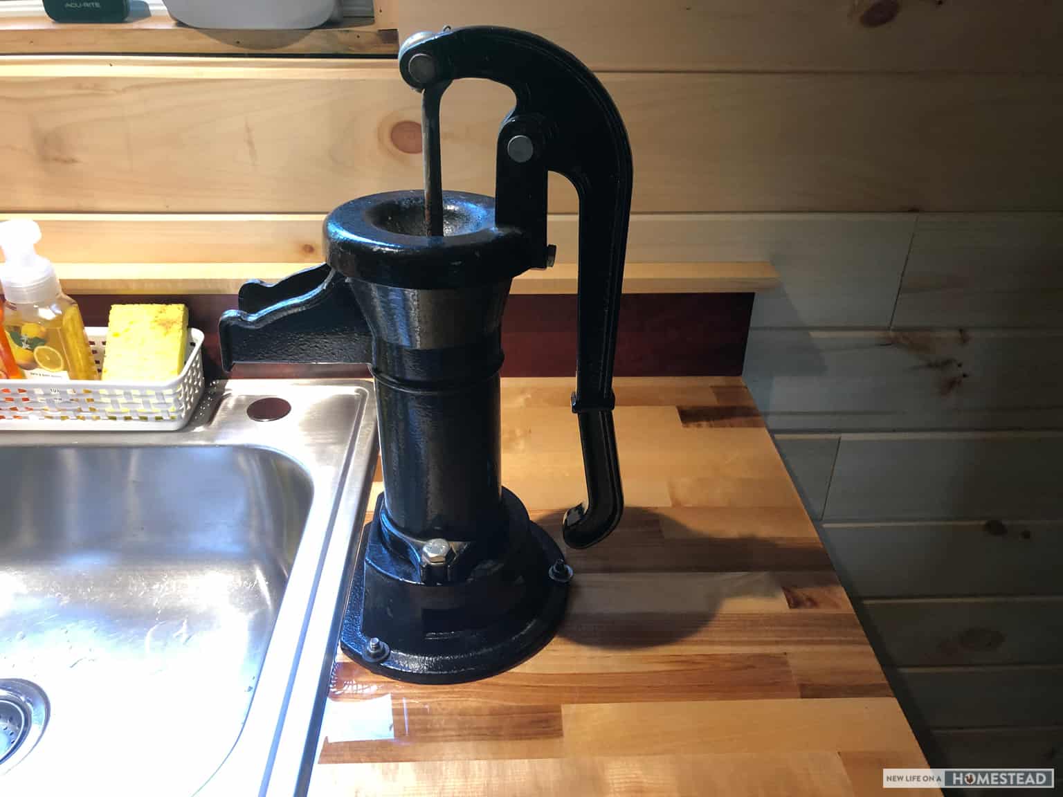 manual pitcher pump on kitchen counter