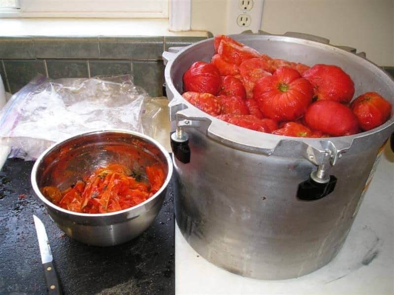 peeled tomatoes in large pot