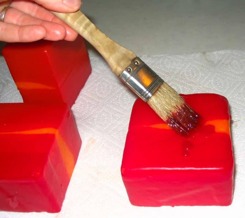 painting cheese with wax