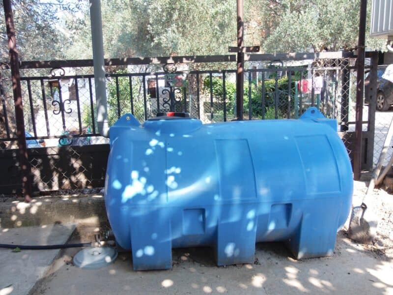 large drum for catching rainwater