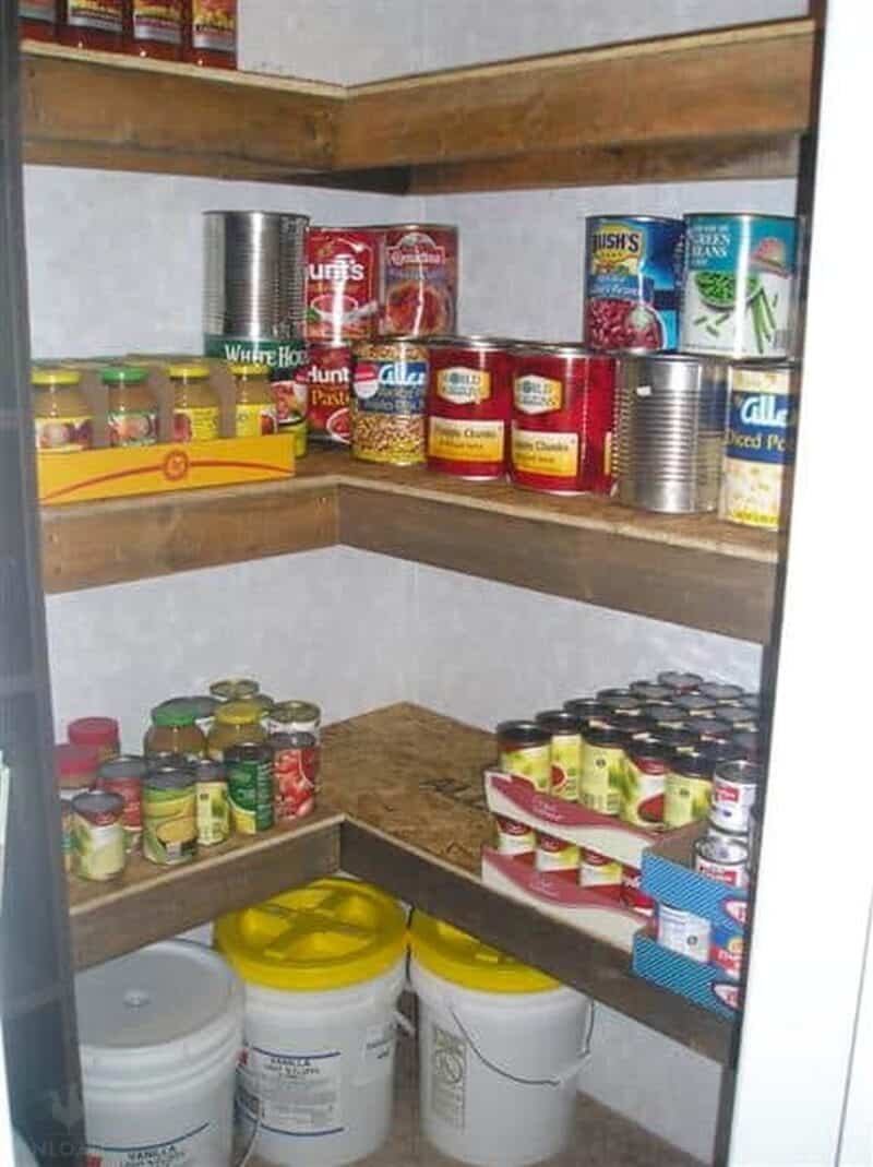 repurposed closet to pantry with canned foods and buckets