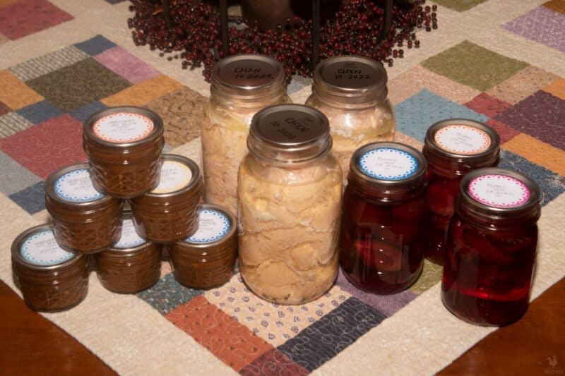 jars of canned chicken hot sauce and plums