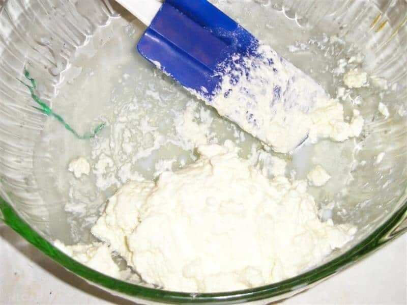 scooping butter from blender