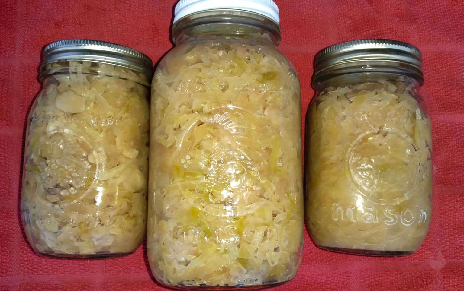 three cans of sauerkraut