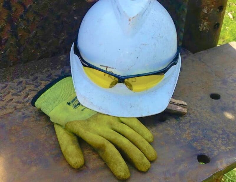 work gloves safety glasses and a hard hat