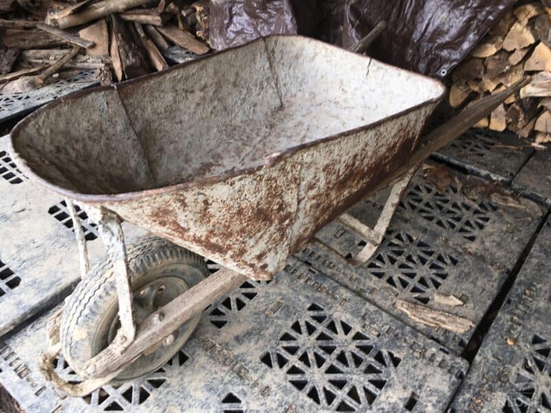 a rusty wheelbarrow