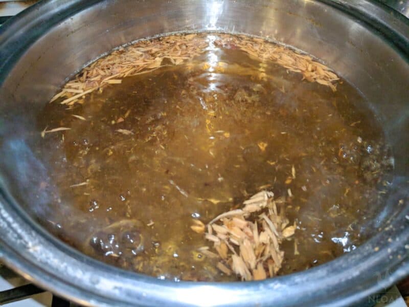 boiling tree bark in pot