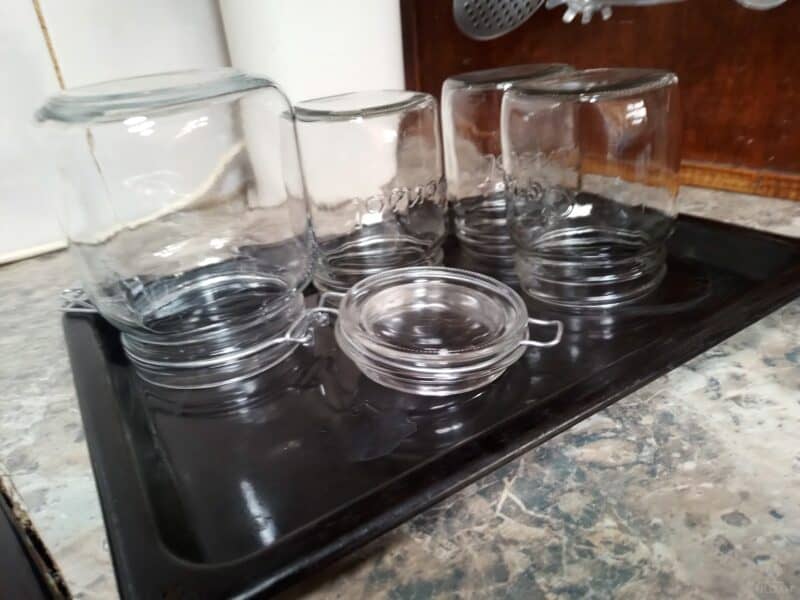 sterilized canning jars on tray
