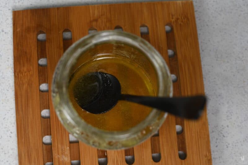 decrystallized honey inside glass jar