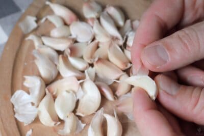 peeling a garlic clove