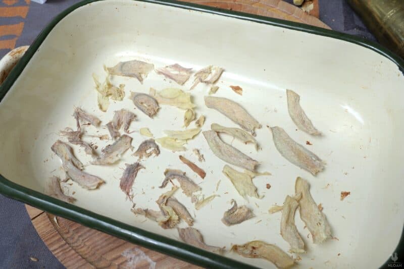 tray of ginger root slices during baking process