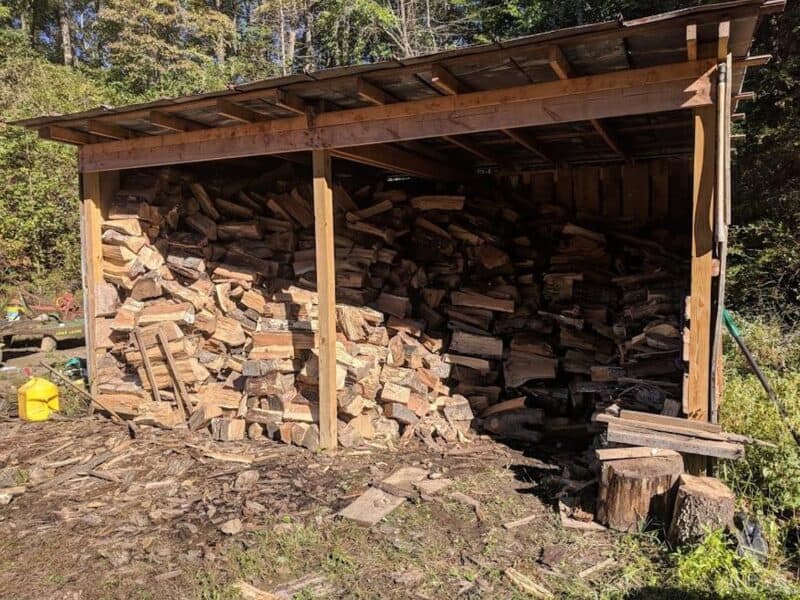 pile of wood in woodshed