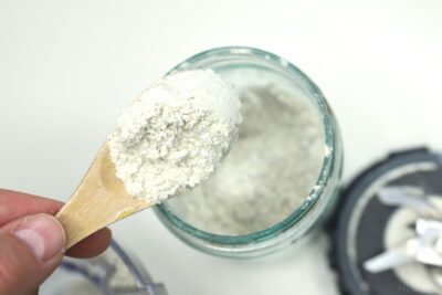 homemade oat milk powder in spoon