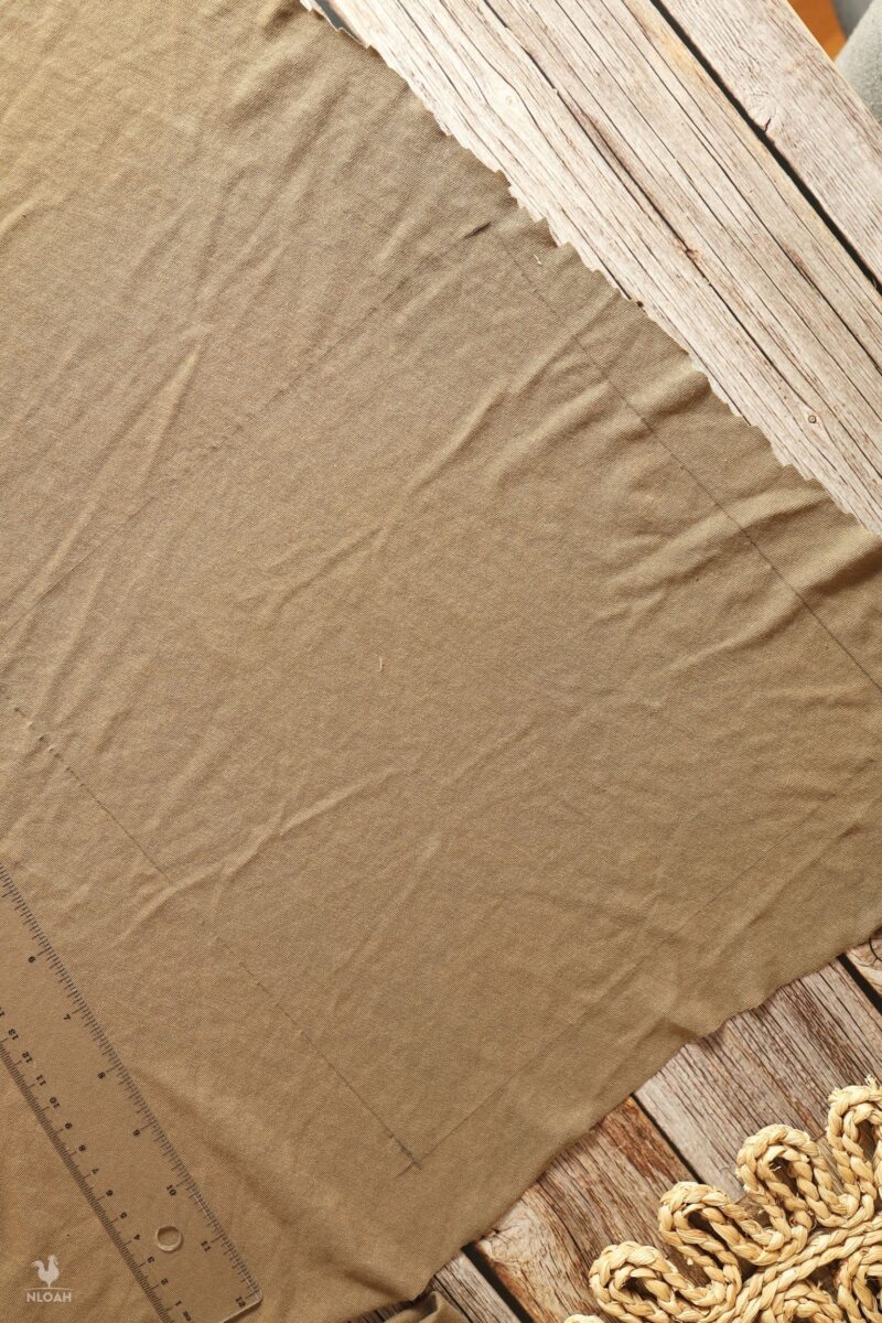 measured fabric with pencil