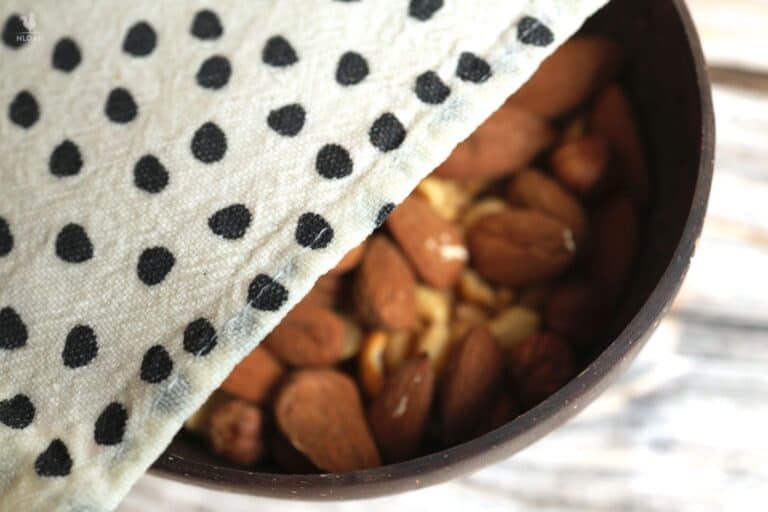 beeswax wraps covering bowl of almonds